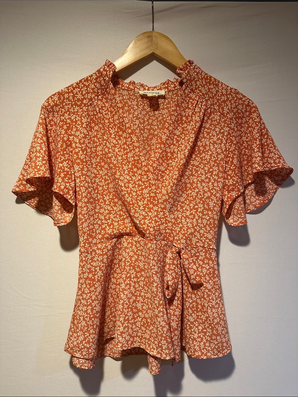 Floral Wrap Peplum Top in Orange